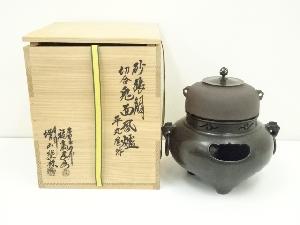 唐銅風炉師　福島宗秀・釜師　増山馨鉄造　砂張銅切合鬼面風炉・平丸釜添（共箱）